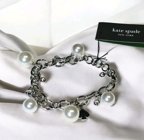 Bracciale Kate Spade New York tono argento ciondolo cristallo perle finte pendente nuovo con etichette