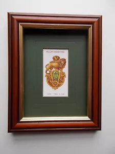 ZIGARETTENKARTE VON WILL'S - LEO STERNZEICHEN GERAHMT - Bild 1 von 2