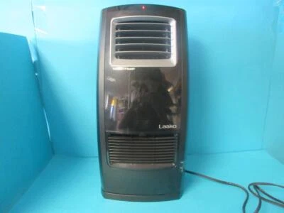LASKO CC23161 MOTION HEAT MOVABLE AIR HEATER BLACK COMBO OSCILLATING HEATER - Image 1 of 4