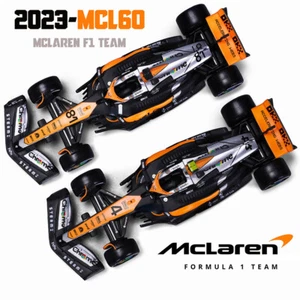 Bburago 1:43 Mclaren F1 MCL60 2023 #4 Lando Norris #81 Oscar Piastri Model Car - Picture 1 of 24