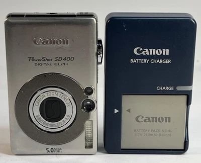 Canon PowerShot SD400 Digital ELPH Camera W/ Battery Charger Tested Working - Image 1 of 4