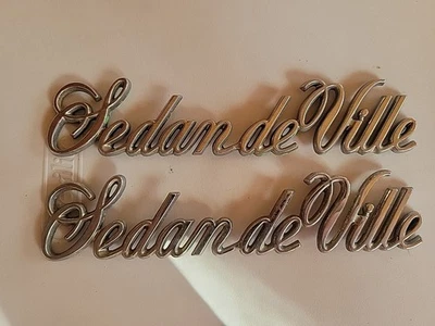(2) Cadillac OEM Sedan deVille Chrome Emblems - Image 1 of 4