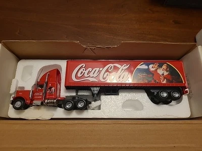 Matchbox  1/58 Peterbilt 359 Tractor Trailer Tis the Season for Coca Cola in Box - Image 1 of 4