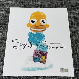 SAB SHIMONO SIGNED AUTOGRAPH 8X10 PHOTO THE SIMPSONS ACTOR BECKETT BAS COA - Picture 1 of 1