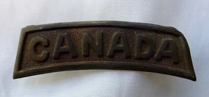 WW1 CANADIAN SHOULDER TITLE 'CANADA' BRASS METAL, LUGGED. A NICE EXAMPLE. - Imagen 1 de 3