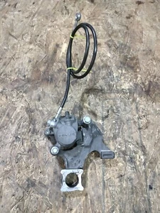 2008-2009 SUZUKI GSXR 600 750 OEM REAR BRAKE CALIPER HANGER W/ BRAKE LINE - Picture 1 of 7