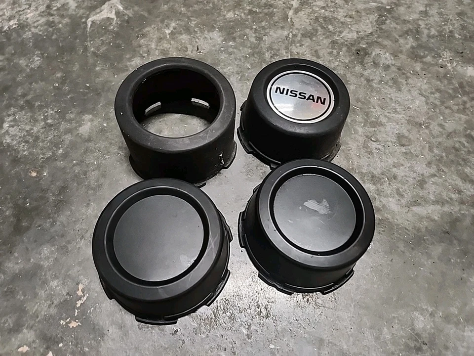 Juego tapacubos tapacubos central rueda camioneta Nissan Pathfinder 1988-1995 OEM D21 Foto 1 de 4