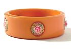 Orange Bakelite Bangle with Celluloid Flower Clusters
