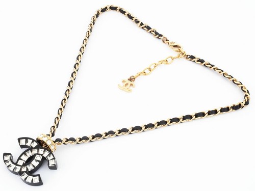 Collana girocollo Chanel Coco Mark in pelle metallo strass oro nero donna