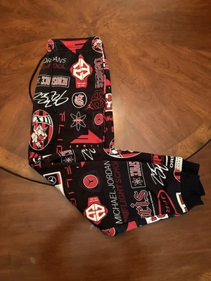 JORDAN FLEECE PANTS MENS SZ L RED BLACK STANDARD FIT NWT GRAPHIC HM7257-010 - Image 1 of 4