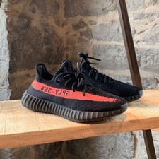 yeezy black red stripe