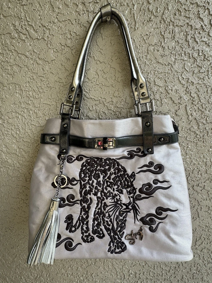 Bolsos de mano Sharif de tela de cuero plateado bolsos de hombro bordados negro leopardo Foto 1 de 4