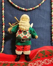 Clothtique (?) 10.5" Fabriche Santa Wearing Argyle Sweater with Skies and Sled