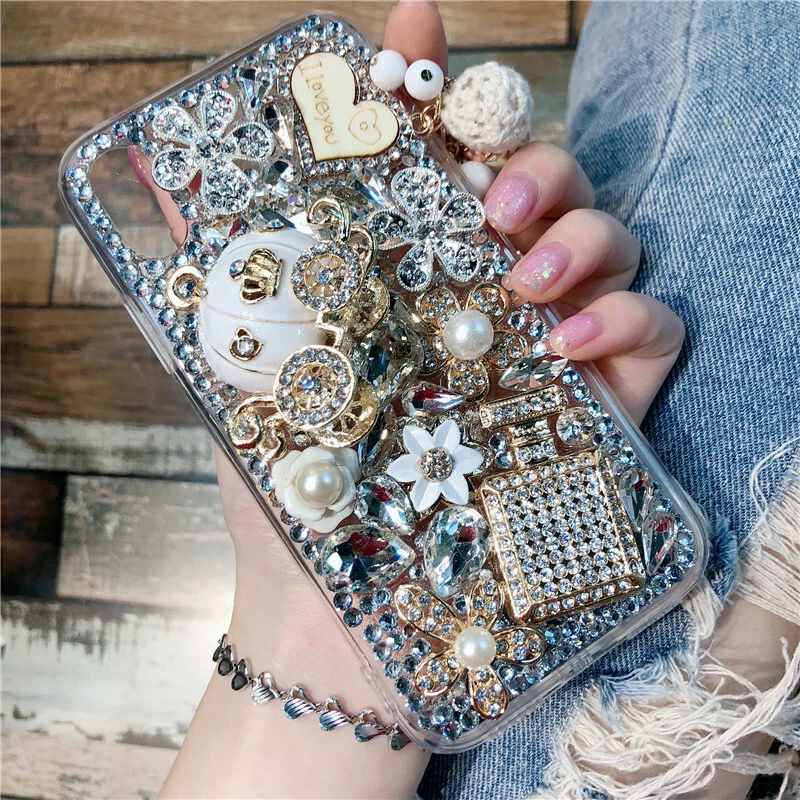 Estuche de cristal con diamantes de imitación de diamantes brillantes gemas brillantes de lujo para teléfonos celulares Foto 1 de 4