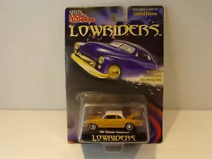Racing Champions Lowriders '60 Chevy Corvair 1960 Chevrolet Gold NIP 1/64 - Picture 1 of 3