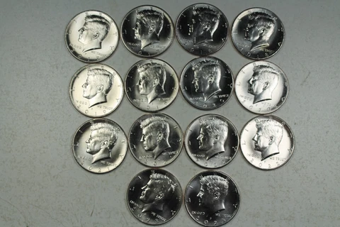 2017 - 2023 P&D Kennedy Half Dollar. Gem Brilliant Uncirculated  Mint Roll Set Cover