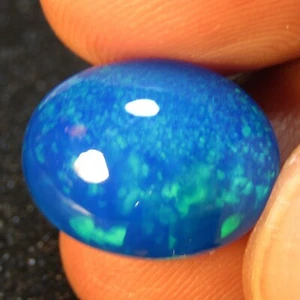 5.54Cts Firing Natural Multi Color Play Blue Opal Oval Gemstone From Ethiopia - Picture 1 of 6