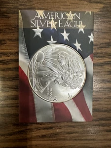 2013 American Silver Eagle $1 Coin H.E. Harris BU - Picture 1 of 2
