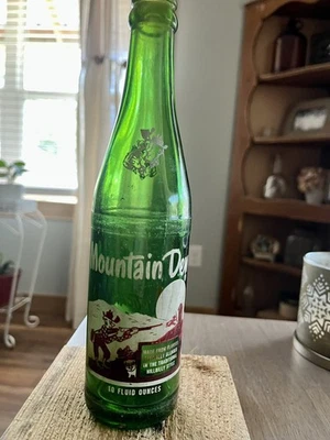 Botella Hillbilly Mountain Dew vintage 12 oz roja ACL años 60 roja/blanca Foto 1 de 2