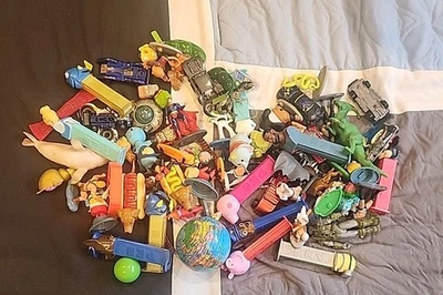 Random Lot Of Kids Toys Cars, Action Figures, Fight Toys, And Pez Dispensars - Image 1 of 3
