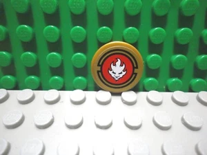 Lego 1 Pearl Gold 2x2 round tile with sticker of Ninjago - Picture 1 of 1