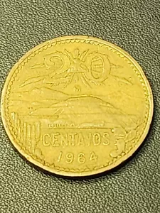 1964 Mexico 20 Centavos featuring Pyramid, Eagle. Used with Slight Damage - Picture 1 of 2