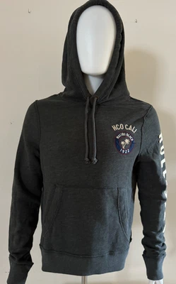 Hollister Hombre Bordado Malibu Beach 1992 Jersey Sudadera con Capucha Gris L Foto 1 de 4