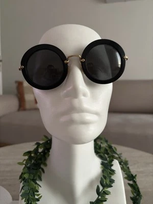 Gafas de sol redondas negras Miu Miu SMU13N 1AB-1A1 Foto 1 de 4