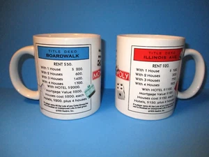 (2) Zwei Monopoly Boardwalk & Illinois Kaffeetassen Hasbro Brettspiel Motiv - Bild 1 von 3