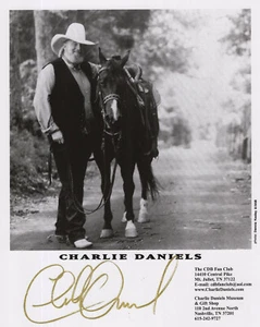 CHARLIE DANIELS HAND SIGNED 8x10 PHOTO+COA AWESOME POSE WITH HIS HORSE - Picture 1 of 1