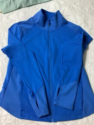 Top deportivo Danskin para dama azul real manga larga cremallera frontal talla M Foto 1 de 4