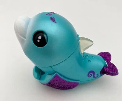 Figura de juguete interactiva Wow wee Fingerlings Baby Light-up Dolphin Foto 1 de 4