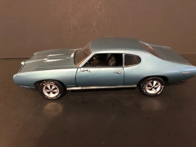 1969 Ertl American Muscle CE бирюзовый Pontiac GTO в 1/18 - колеса Black Dot - Изображение 1 из 4