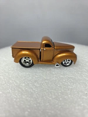 Muscle Machines 1940 Willys Pickup Truck Dark Gold Diecast 1:64 Scale - Image 1 of 4