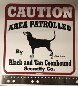 Caution Area Patrolled By Black And Tan Coonhound Sign
