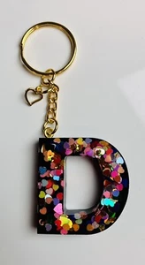 Schlüsselanhänger schwarz Regenbogen Herzen Harz - Bild 1 von 1