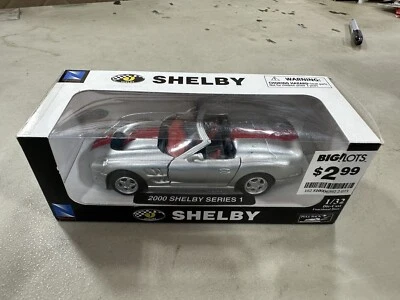 New Ray City Cruiser Collection 1:32 Scale 2000 Shelby Series 1 Diecast Car D32 - Image 1 of 2