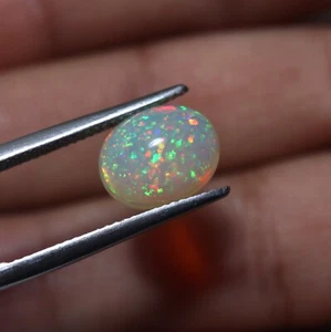2.3 Cts 11.3x9.1 MM Natural AAA Green Red Pin Fire Ethiopian Opal Oval Cabochon - Picture 1 of 16