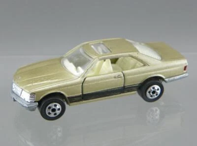 De colección 1984 Road Champs Diecast 1/64 Champagne Dorado y Negro Mercedes 500 SEC EN MUY BUENA CONDICIÓN Foto 1 de 4