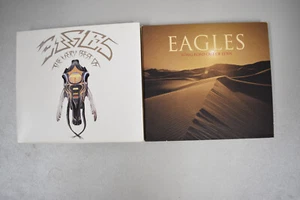 The EAGLES *The Very Best Of* Greatest Hits / LONG ROAD OUT OF EDEN  NM - Picture 1 of 2