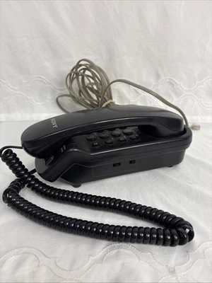 Teléfono con cable Sony IT-B3 de colección dial con botón negro y cable en espiral negro Foto 1 de 4