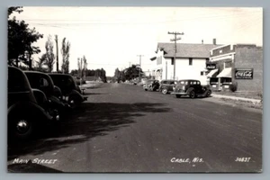 RPPC postcard 1940s view Main Street Cable, WIS., Coca Cola, cars, buildings - Picture 1 of 2