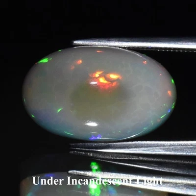 💎 6.77ct 17x10.5mm Oval Cabochon Natural White Opal - Color Play, Africa Gem - Image 1 of 4