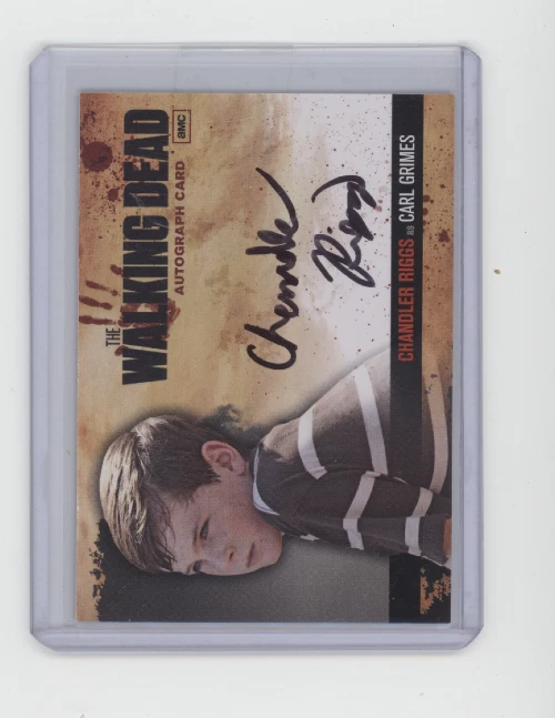 2011 WALKING DEAD CRYPTOZOIC CHANDLER RIGGS AUTO AUTOGRAPH A7 CARL GRIMES - Image 1 of 2