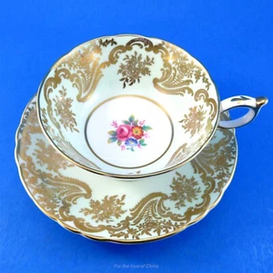 Floral Center with Green and Gold Border Paragon Tea Cup & Saucer (some crazing) - Picture 1 of 5