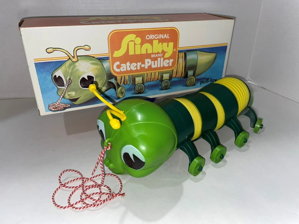 SLINKY CATER-PULLER TOY NEW OLD STOCK 1960'S TO 1970'S - Image 1 of 1