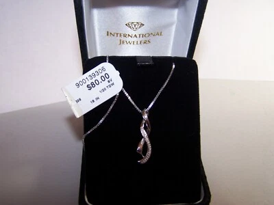 NUEVO COLGANTE Y CADENA KAY JEWELERS 15 DIAMANTES PLATA ESTERLINA CINTA TORCIDA NUEVO EN CAJA Foto 1 de 4