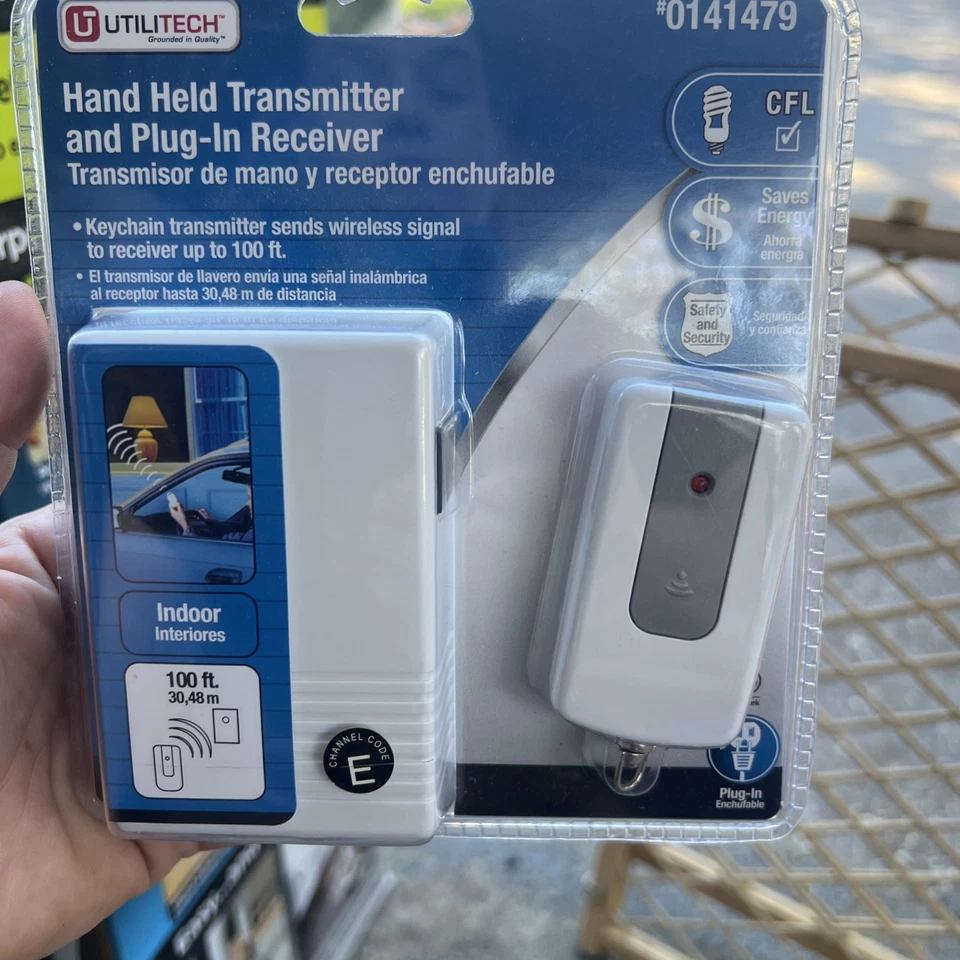 Utilitech Keychain Hand Held Transmitter and Plug-In Receiver #0141479 - Image 1 of 2