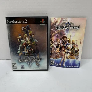 Kingdom Hearts 2 (PlayStation 2 PS2) ottime condizioni etichetta nera CIB completo con scheda reg - Foto 1 di 5