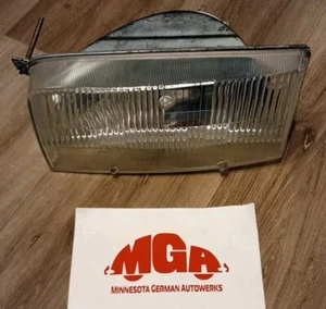 1992-1995 Volkswagen Eurovan Driver Left Side Headlight Housing Hella OEM - Picture 1 of 8